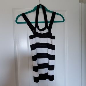 Darling, halter. This halter top was barely worn.